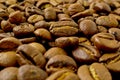 Coffee beans, natural textured brown background, morning espresso drink