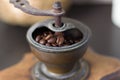 Coffee beans in an old grinder