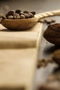 Coffee beans on old vintage open book. Menu, recipe, mock up. Wooden background. Royalty Free Stock Photo