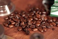 Coffee beans overflowing from a bag of coffee Royalty Free Stock Photo