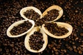 Coffee beans on palm leaf plates in a flower form