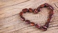 Coffee beans placed in shape of heart