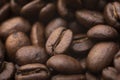 Beans of coffee. Roasted coffee beans, coffee, aromatic food and drinks, close up