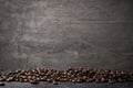 Coffee beans on rustic metal grey background