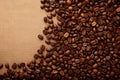 Coffee beans on sackcloth background