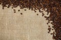 Coffee beans on sacking background Royalty Free Stock Photo