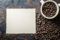 Coffee Beans Scattered Around a Blank Notecard Royalty Free Stock Photo