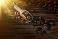 Coffee beans in scoop on vintage wooden board Royalty Free Stock Photo