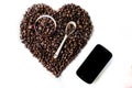 Coffee beans in the shape of a big heart with mug Royalty Free Stock Photo