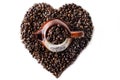 Coffee beans in the shape of a big heart with mug