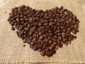 Coffee beans in shape of heart Royalty Free Stock Photo