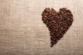 Coffee beans in shape of heart Royalty Free Stock Photo