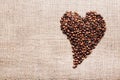 Coffee beans in shape of heart. Happy Valentine Day Royalty Free Stock Photo