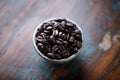 Coffee beans in a small ceramic dish. Royalty Free Stock Photo