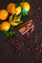 Coffee beans with spices on the old wooden boards. , cinnamon, nuts, star anise Royalty Free Stock Photo