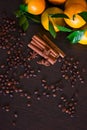 Coffee beans with spices on the old wooden boards. , cinnamon, nuts, star anise Royalty Free Stock Photo