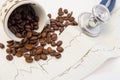 Coffee beans spilled from c and scattered on paper ECG near medical stethoscope. Effect of coffee and caffeine on cardiovascular s