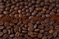 Spilled roasted coffee beans grouped by reverse and obverse. Ground coffee in the middle