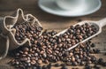 Coffee Beans Spilled out of Burlap Sack Royalty Free Stock Photo