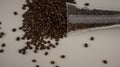 Coffee beans spilled out of the glass Royalty Free Stock Photo