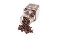 Coffee beans spilling out of a cristal jar Royalty Free Stock Photo