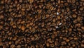 The coffee beans spin rotate quickly fast fly, dispart, splash to the sides with centrifugal coriolis force. Coffee