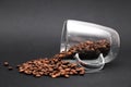 Coffee beans spitted out from cup. Royalty Free Stock Photo