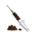 Coffee beans and a syringe.