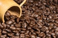 Coffee beans texture background with bamboo cup Royalty Free Stock Photo
