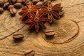 Coffee beans and anise on wooden board Royalty Free Stock Photo