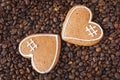 Coffee beans and two cookies with heart shape, happy valentine`s day Royalty Free Stock Photo