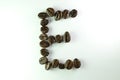 Alphabet E form Coffee beans in white background Royalty Free Stock Photo