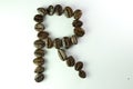 Alphabet R form Coffee beans in white background Royalty Free Stock Photo