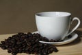 Coffee beans, white coffee mugs placed on wooden Royalty Free Stock Photo