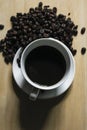 Coffee beans, white coffee mugs placed on wooden Royalty Free Stock Photo