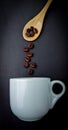 Coffee beans and white cup