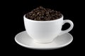 Coffee Beans in White Cup on Saucer Royalty Free Stock Photo