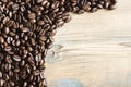 Coffee beans on wood background Royalty Free Stock Photo