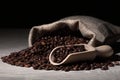 Coffee beans on a wood surface with a scoop and hessian sack Royalty Free Stock Photo