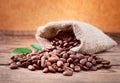 Coffee beans on wood texture Royalty Free Stock Photo