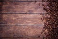 Coffee beans wooden background