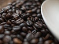 Coffee beans on wooden desk background Royalty Free Stock Photo