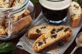 Coffee with biscotti or cantucci on wooden vintage table, traditional Italian biscuit