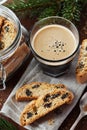 Coffee with biscotti or cantucci on wooden vintage table, traditional Italian biscuit