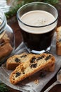 Coffee with biscotti or cantucci on wooden vintage table, traditional Italian biscuit