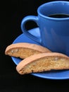 Coffee & Biscotti Closeup (on black) Royalty Free Stock Photo
