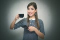 Coffee break. Coffee time. Lunch break. Girl with cup of coffee isolated on gray background.