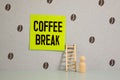Coffee break inscription on wooden table background Royalty Free Stock Photo