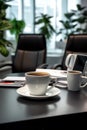 Coffee break in office. Coffee cups on the table. Blurred background