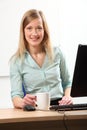 Coffee break for young blonde business woman Royalty Free Stock Photo